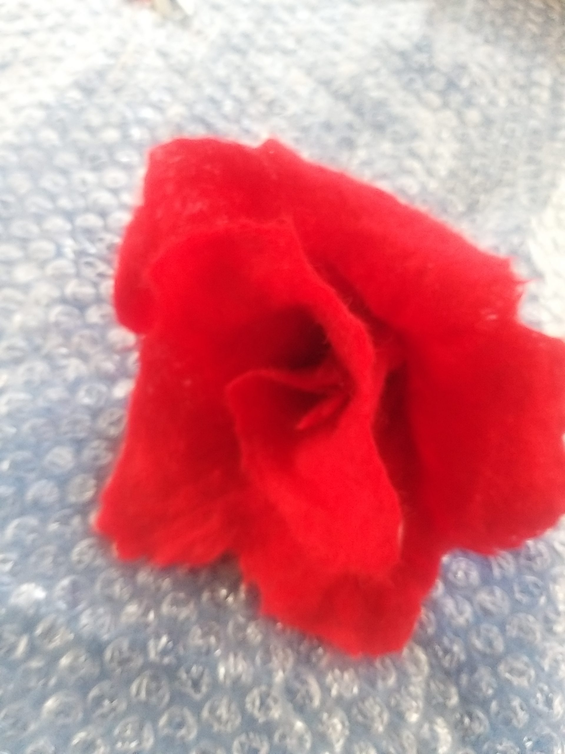 Large felt flower with clip for a handbag to complete a wedding outfit